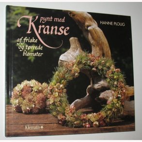 Pynt med kranse af friske og trrede blomster